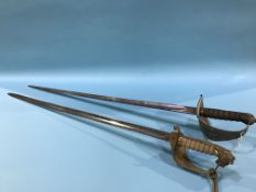 An officer's sword signed Robert Mole and a Naval officers sword (2)