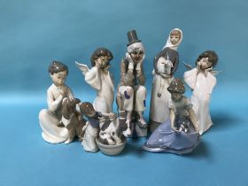 Five Lladro figures and two others (7)