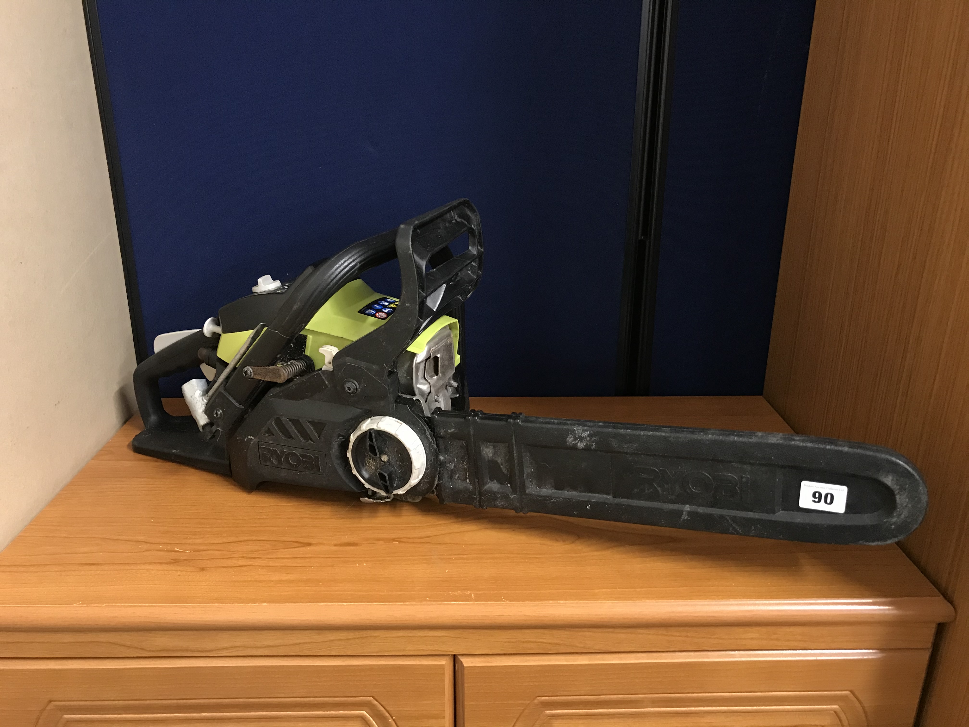 A Ryobi chain saw