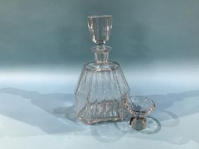 A clear glass decanter, with a set of twelve liqueur glasses