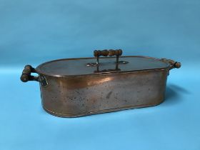 A copper fish kettle