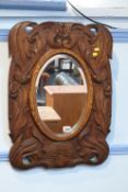 Carved decorative mirror, 63 x 46cm