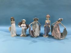 Four various Lladro figures and a Nao figure