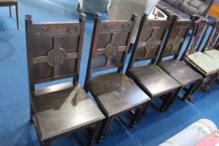 A set of four oak dining chairs