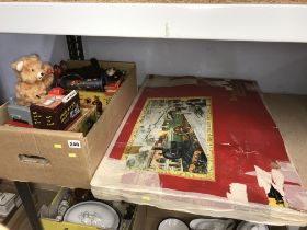 A train set and a box of vintage toys