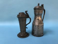 An antique pewter tapit hen and an antique German ale jug, inscribed Hans Barckman, bears date 1645