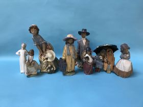 A collection of eight Lladro figures