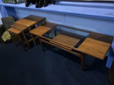 G Plan teak and glass coffee table and a teak nest of tables