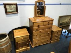 Pine chest of drawers and a pair of pine bedside chests
