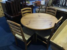 Pine kitchen table and four chairs