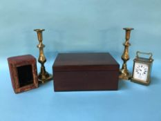 A mahogany work box, a pair of candlesticks and a carriage clock