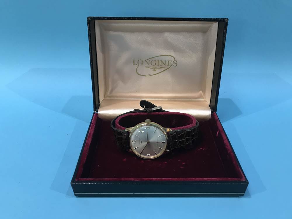 A gents 9ct gold Longines wristwatch, with box
