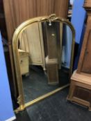 A Gilt overmantle mirror