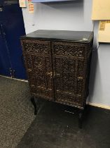 An oriental two door cabinet