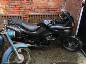 A Honda Deauville motorbike CC 650CC, registered 22nd March 2005 (with V5)