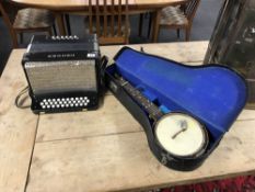 A ukelele banjo and a Hohner accordion (2)