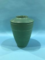 A Wedgwood Keith Murray green tapering vase with concentric bands, H 28cm