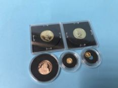 Collection of gold coins including two one fortieth ounce gold proof coins, two 9ct gold pennies and