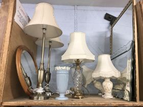 Three mirrors and various table lamps
