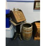 A barrel, a stand and a coal scuttle