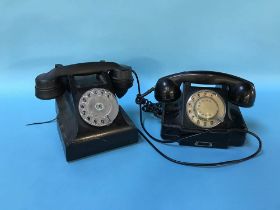 Two black Bakelite telephones