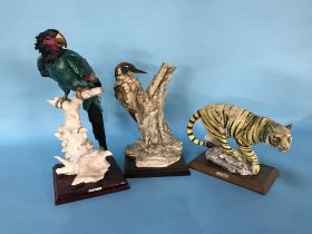 A Capo Di Monte woodpecker, parrot and a tiger