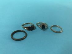 Four 9ct gold rings, 8.5g