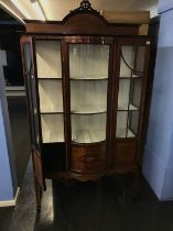 An Edwardian mahogany china cabinet