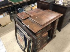 A walnut cased treddle sewing and a hostess trolley