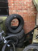 A set of four tyres size R18 119/1160 and a bench