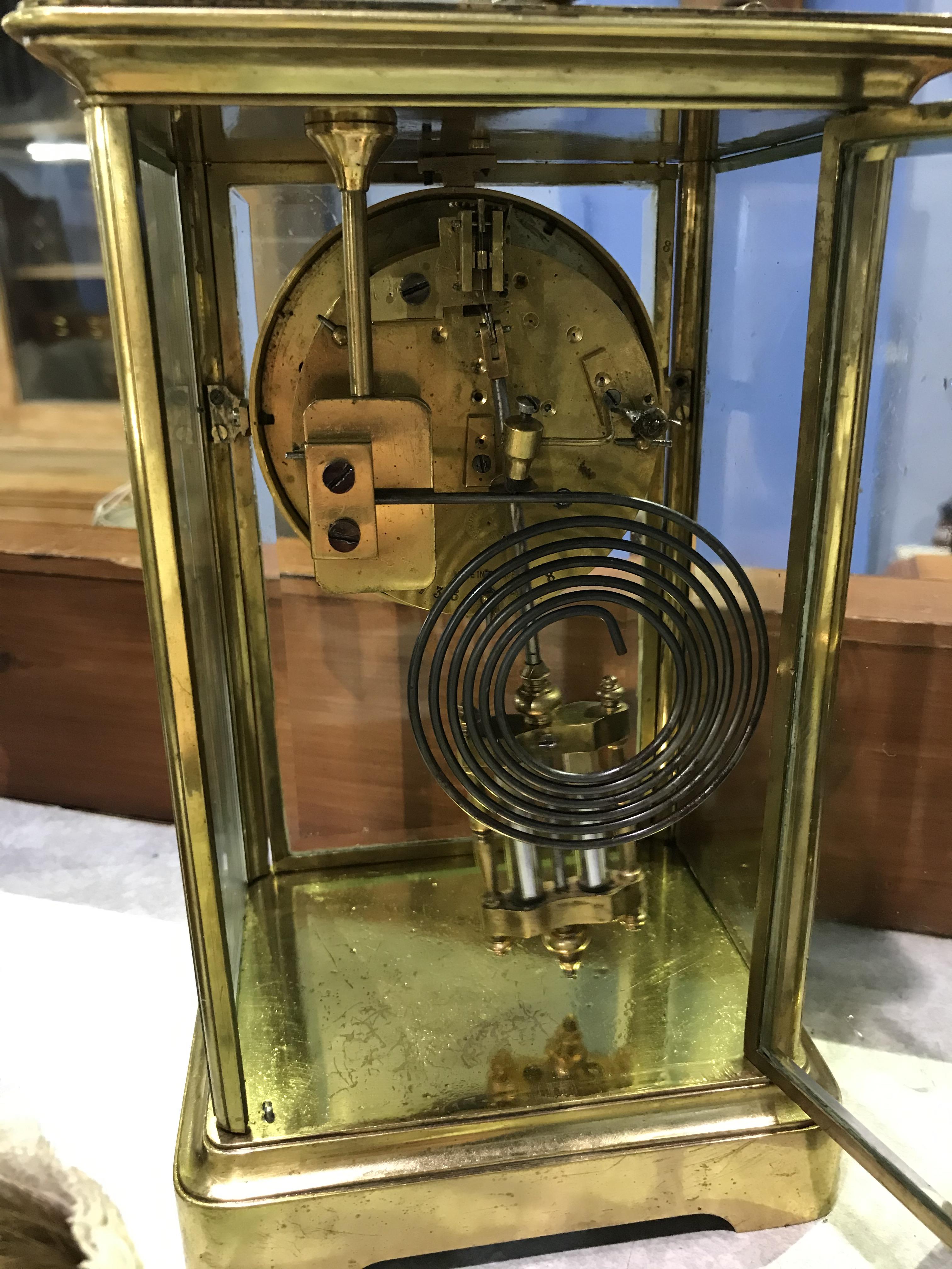 A Mappin and Webb brass carriage clock and two other clocks - Image 10 of 10