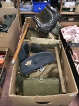 Assorted militaria in two boxes