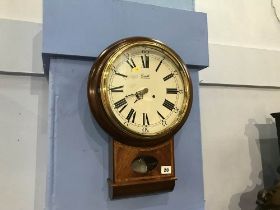 A Comitti of London mahogany wall clock