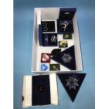 Collection of Swarovski crystals, including Christmas ornaments