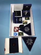 Collection of Swarovski crystals, including Christmas ornaments