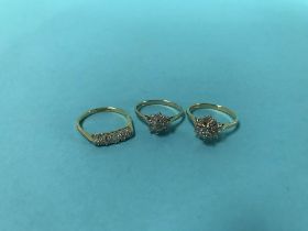 Two 18ct gold rings, 5.4g and a 9ct ring, 1.6g