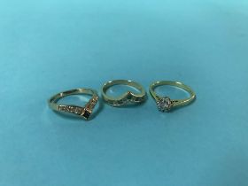 Two 9ct rings, 4g and an 18ct ring, 2.7g