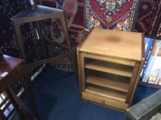 Two teak triangular occasional tables and a hi-fi cabinet