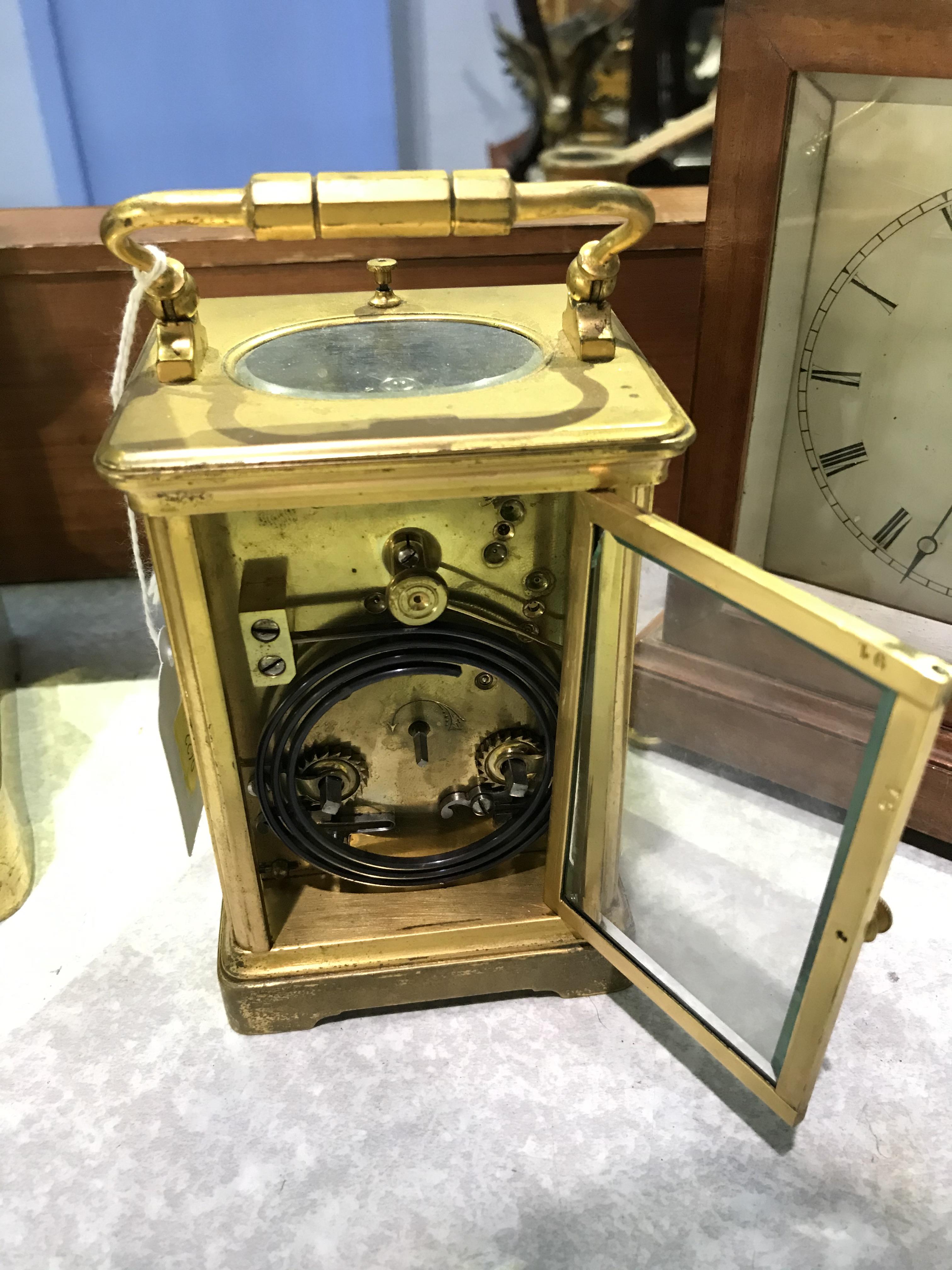 A Mappin and Webb brass carriage clock and two other clocks - Image 9 of 10