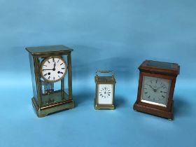 A Mappin and Webb brass carriage clock and two other clocks