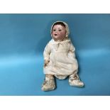 An Armand Marseille bisque headed doll with composite body, stamped A10M and D.R.G.M. 259