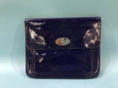 Mulberry electric blue drummed patent clutch bag