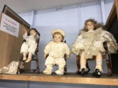 Three dolls