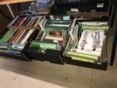 Four boxes of cricket books