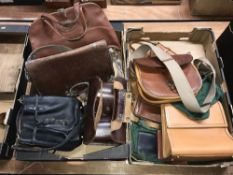 Collection of leather satchels, cartridge bags etc in two boxes