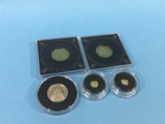 Two 9ct 1p gold coins and three others