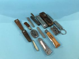 Collection of pocket knives and Leatherman's