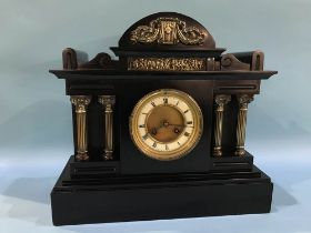 A Victorian slate mantel clock, with eight day movement