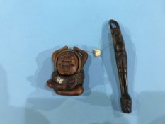 A carved wooden Japanese smoking set