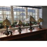 Four Tiffany style lamps